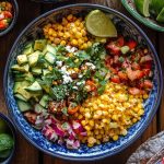 Colorful spread of traditional Mexican dishes with salsa, guacamole, tortillas, and fresh toppings for Cinco de Mayo celebration – perfect party food ideas from EternalSlots.com.