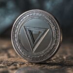 Close-up of TON crypto coin on a reflective surface, highlighting its sleek design and role in fast digital payments and online casino transactions.