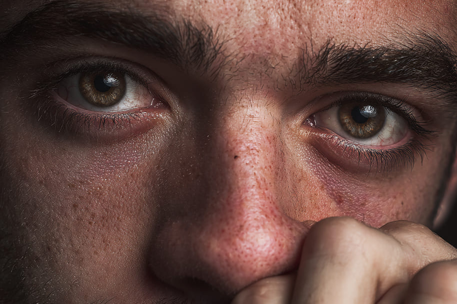 Emotional portrait of Diogo Jota with teary eyes, capturing the raw human side of the football star.