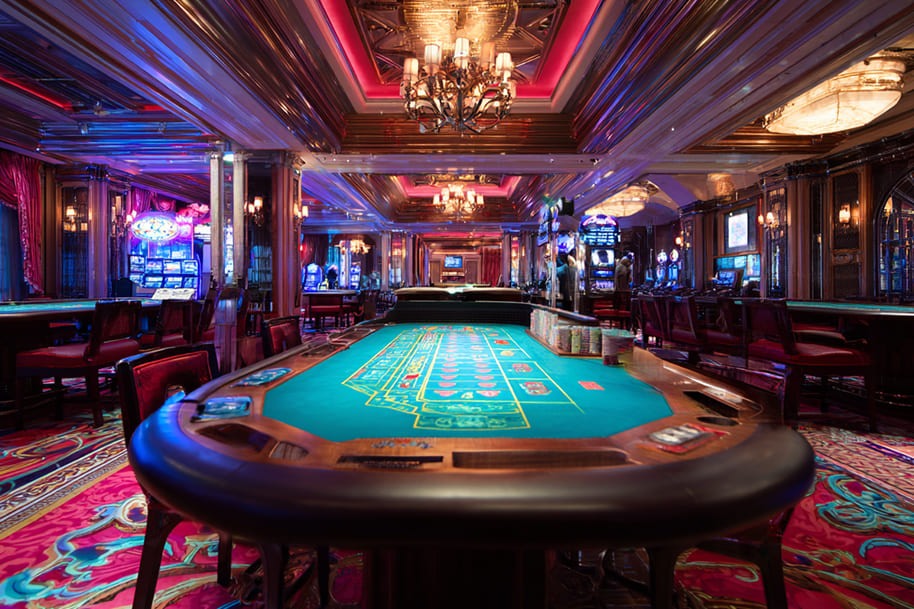 Luxurious Las Vegas casino interior with vibrant lighting, poker tables, and slot machines ready for the UNO casino launch.
