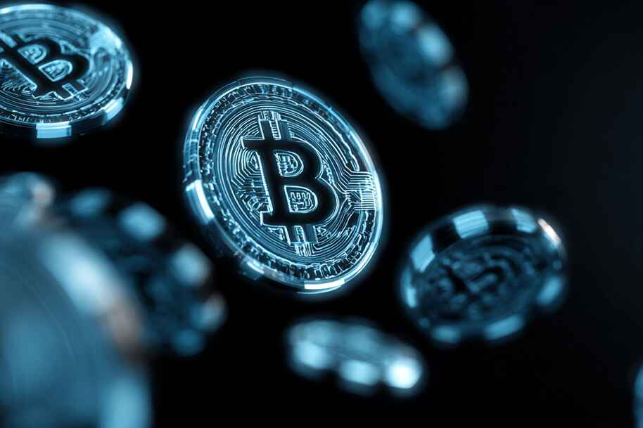 Digital blue Bitcoin coins representing blockchain technology and secure crypto transactions in online casinos like Eternal Slots for safe gambling.