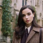 Young woman in Oxford-style setting, inspired by the Netflix movie “My Oxford Year,” featured in Eternal Slots Casino blog on best new movies streaming now.