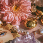 Astrology and self-care flatlay with flowers, crystals, pearls, and vintage art symbolizing zodiac sign wellness rituals, featured on Eternal Slots Casino blog