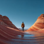 Traveler exploring The Wave rock formation in Arizona – iconic Southwest desert escape for scenic road trips and spiritual adventures.