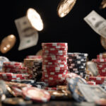 Casino chips stacked with flying money and gold coins symbolizing low wagering bonuses at Eternal Slots.